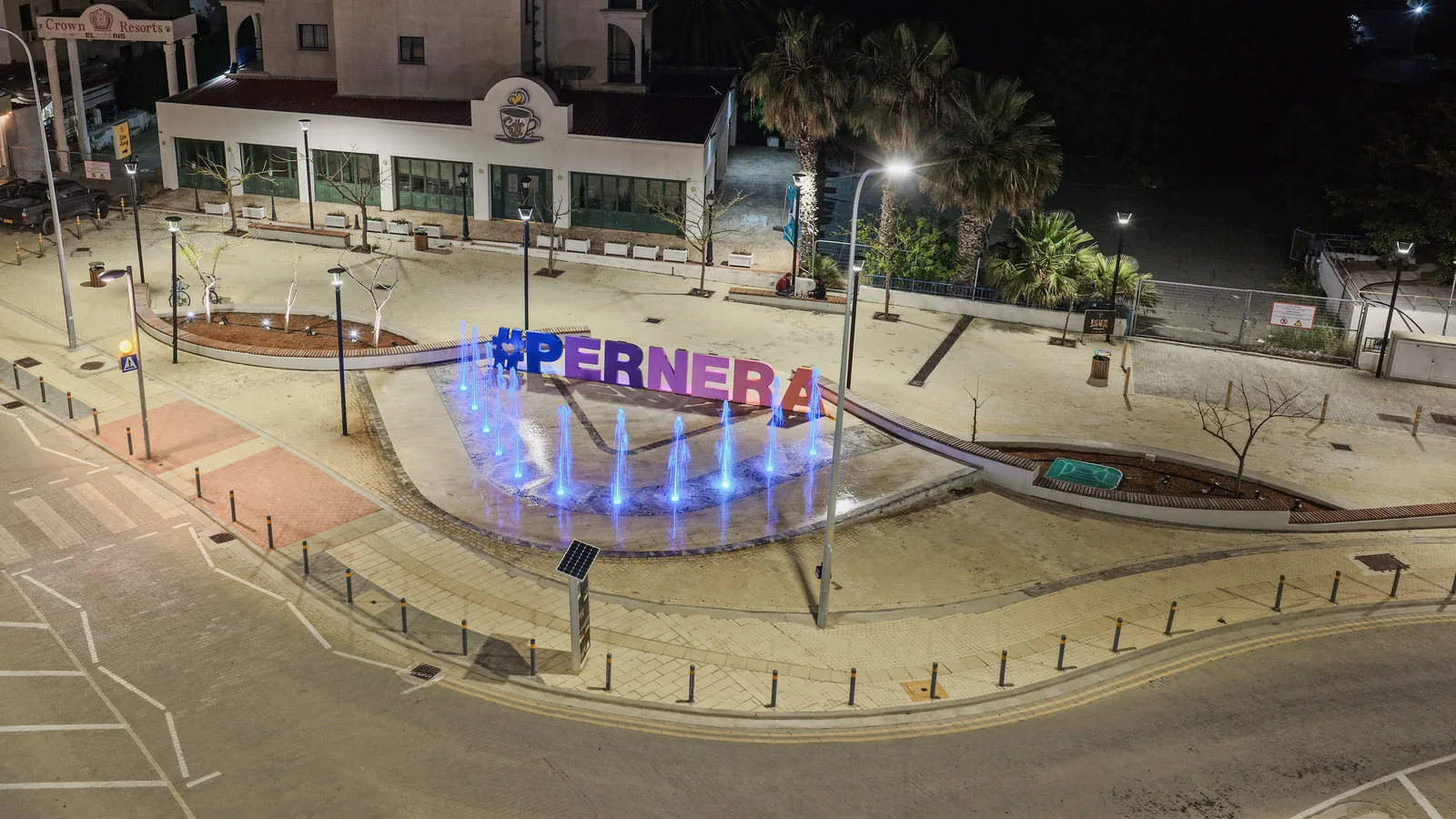 Architectural and ambient lighting illuminating Pernera Square in Protaras at night